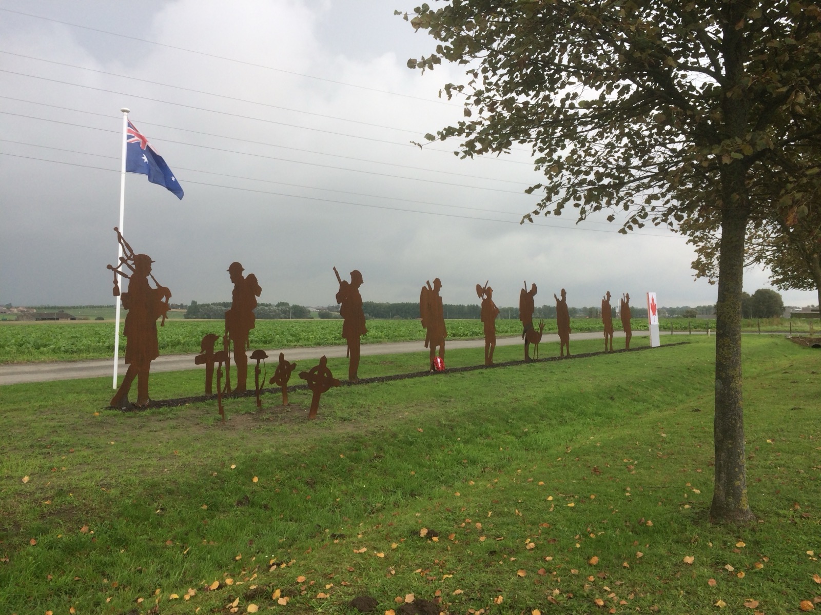 Silhouette figures at the Frezenberg memorial